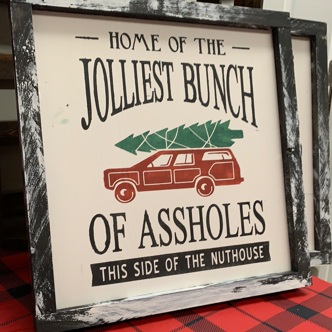 Home of the Jolliest Bunch Sign