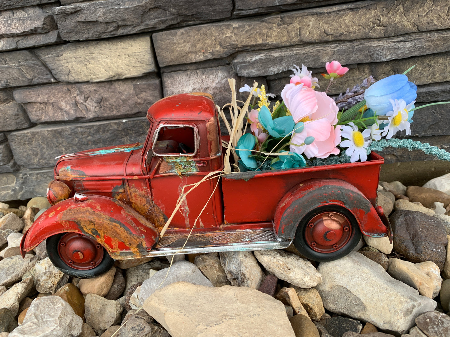 Patina red truck with spring bouquet